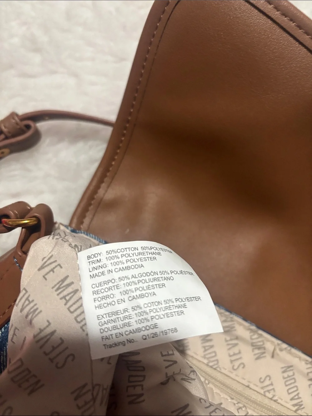 Steve Madden Blue Logo Denim Crossbody with Tan Trim and Orange Charm